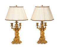 A Pair of Louis XV Gilt Bronze Four-Light Figural Candelabra
