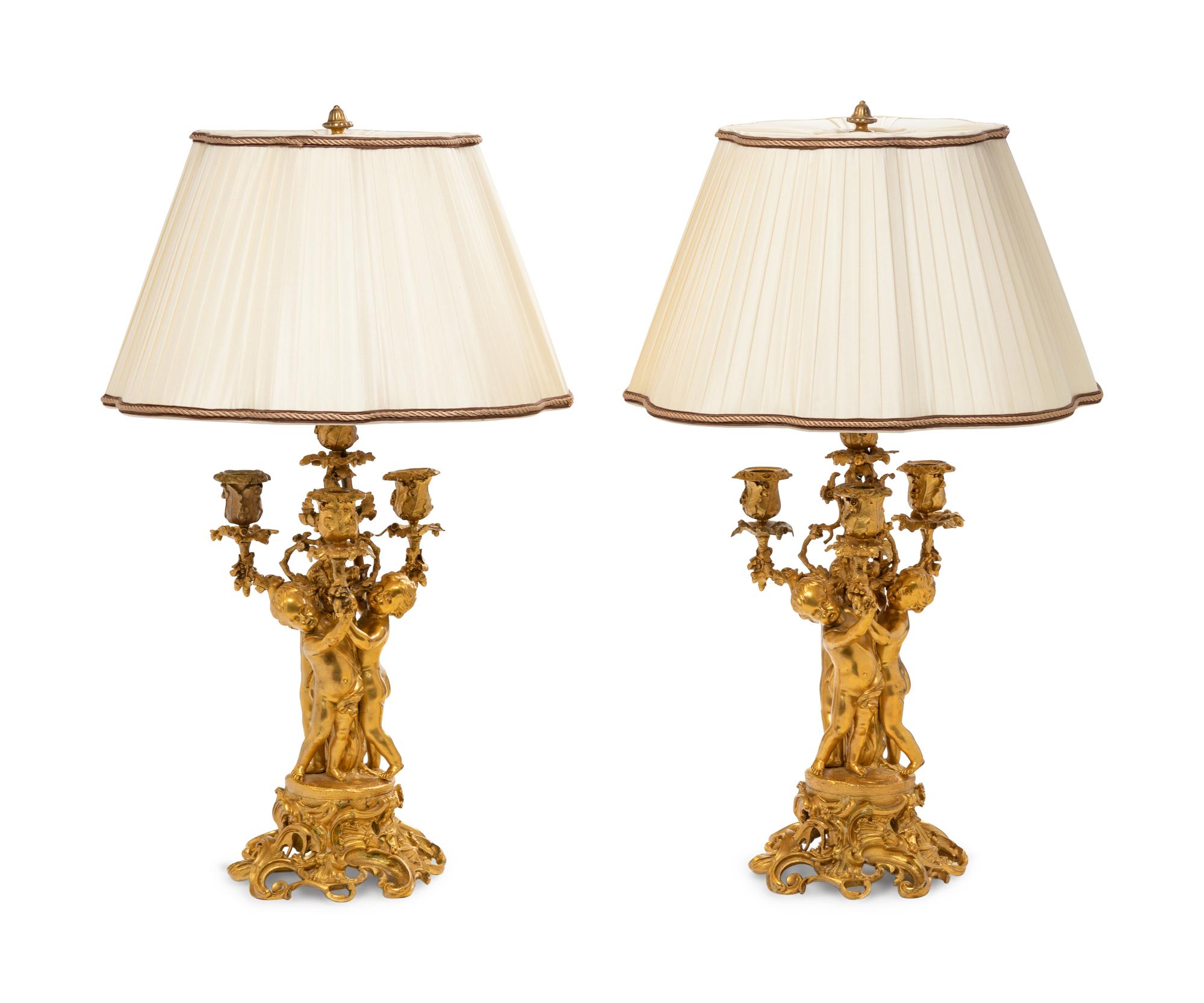 A Pair of Louis XV Gilt Bronze Four-Light Figural Candelabra