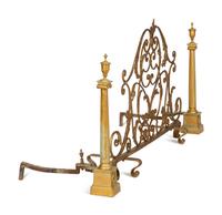 A Pair of Continental Gilt Bronze Chenets and an Associated Fire Screen