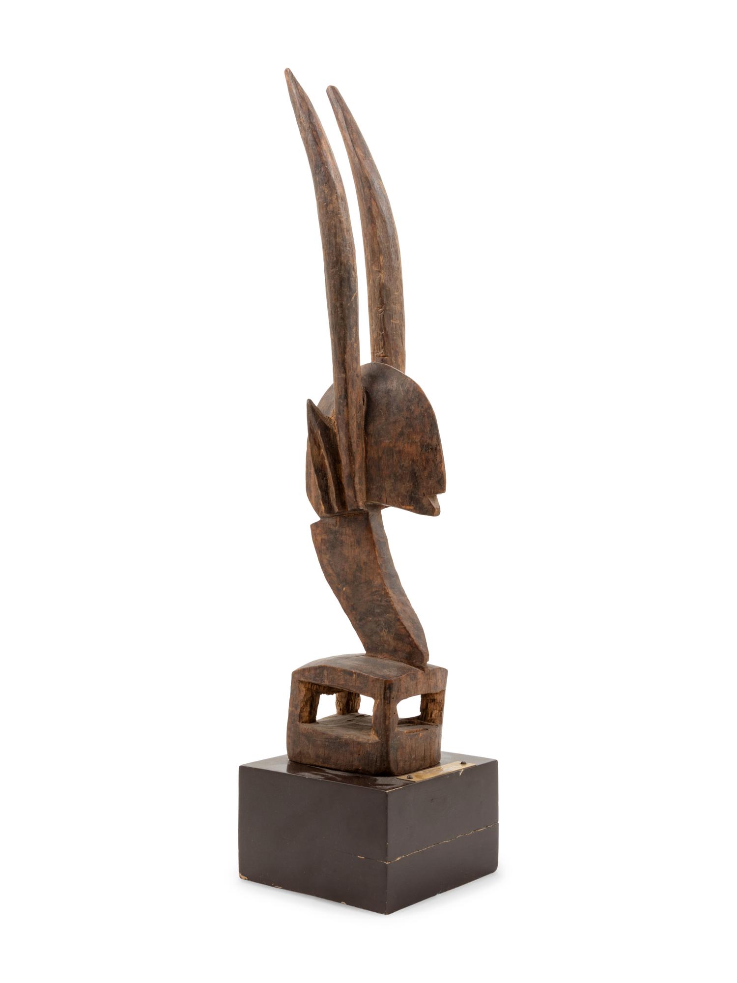 A Bambara Carved Wood Antelope Sculpture