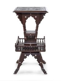 A Walnut Pedestal Table