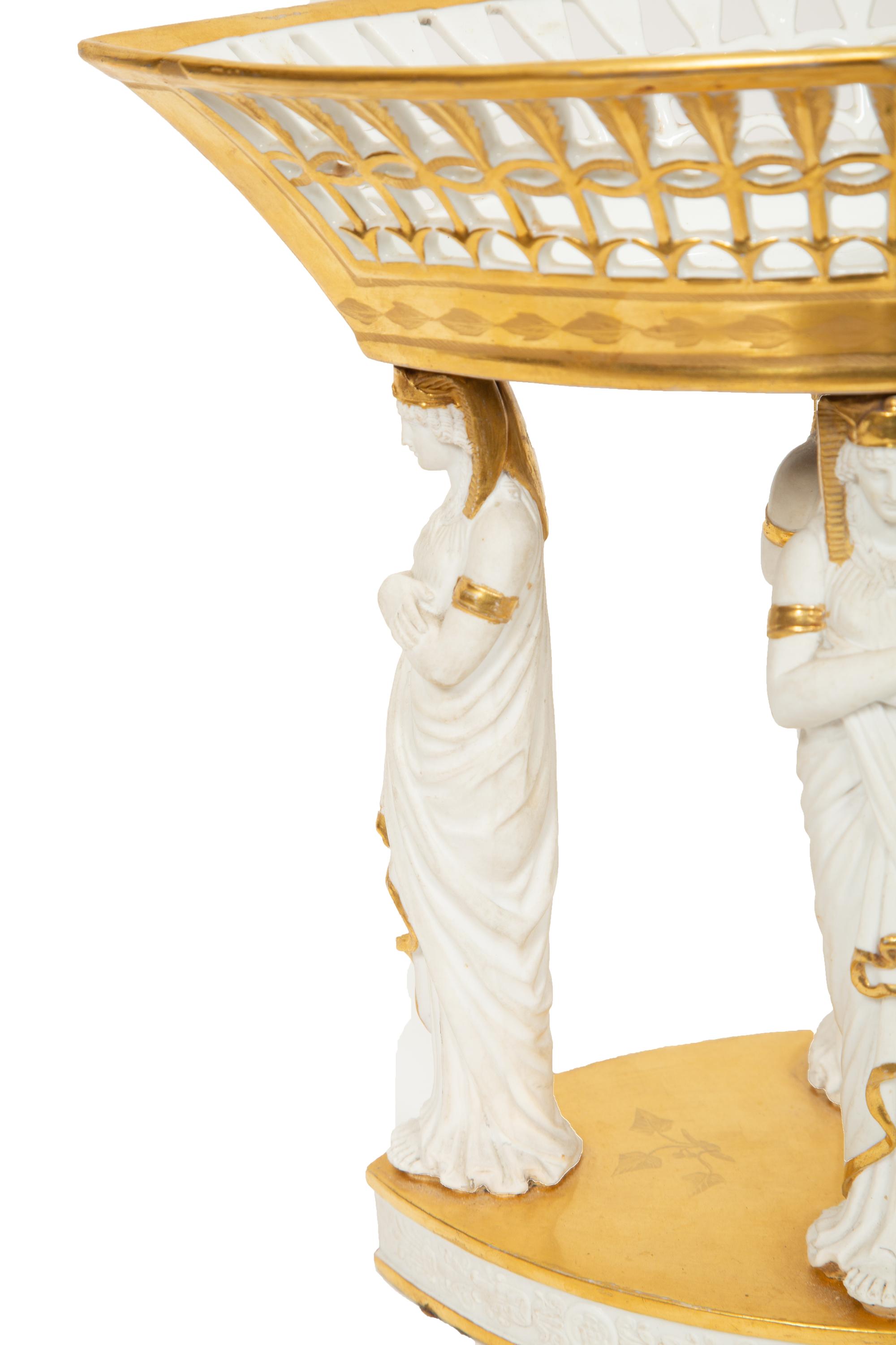 A Paris Porcelain Egyptian Revival Parcel Gilt Bisque Porcelain Centerpiece