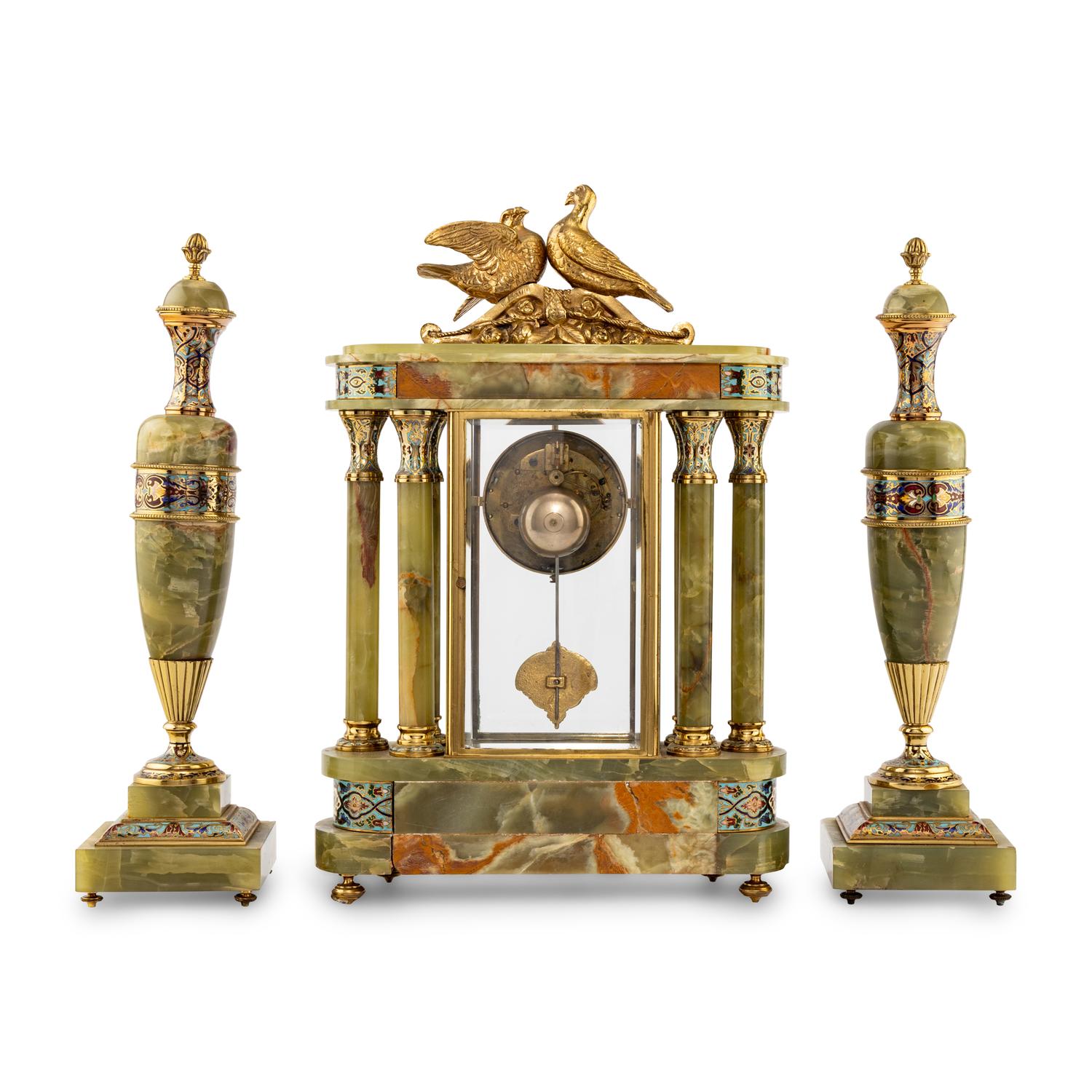 A French Green Onyx, Gilt-Metal and Champlevé Three-Piece Clock Garniture
