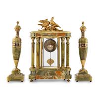 A French Green Onyx, Gilt-Metal and Champlevé Three-Piece Clock Garniture
