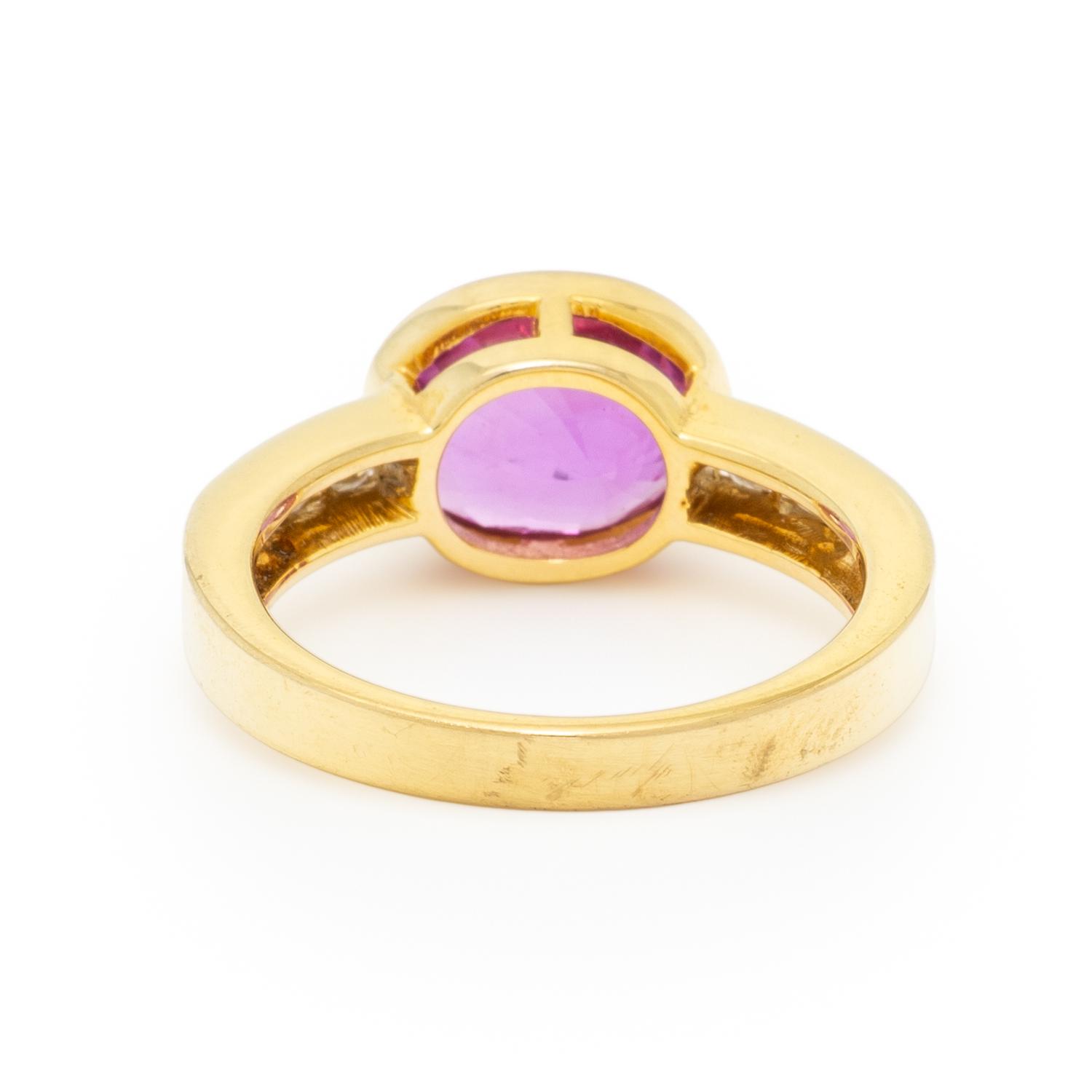 PINK SAPPHIRE, DIAMOND, AND YELLOW GOLD RING