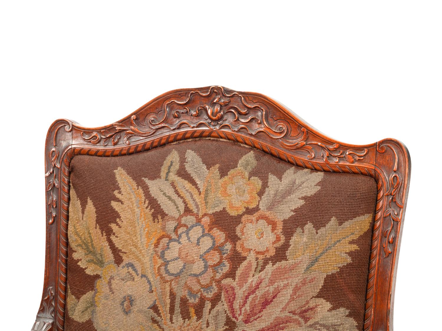 A Pair of Régence Style Walnut Fauteuils