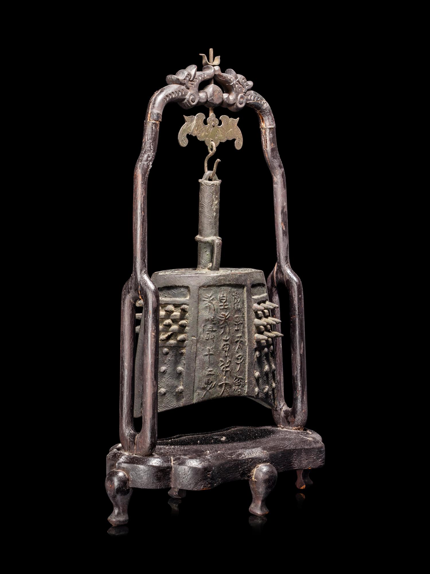 A Chinese Bronze Bell with Stand