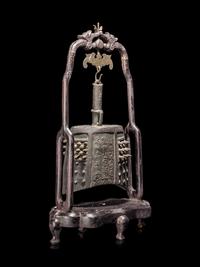 A Chinese Bronze Bell with Stand