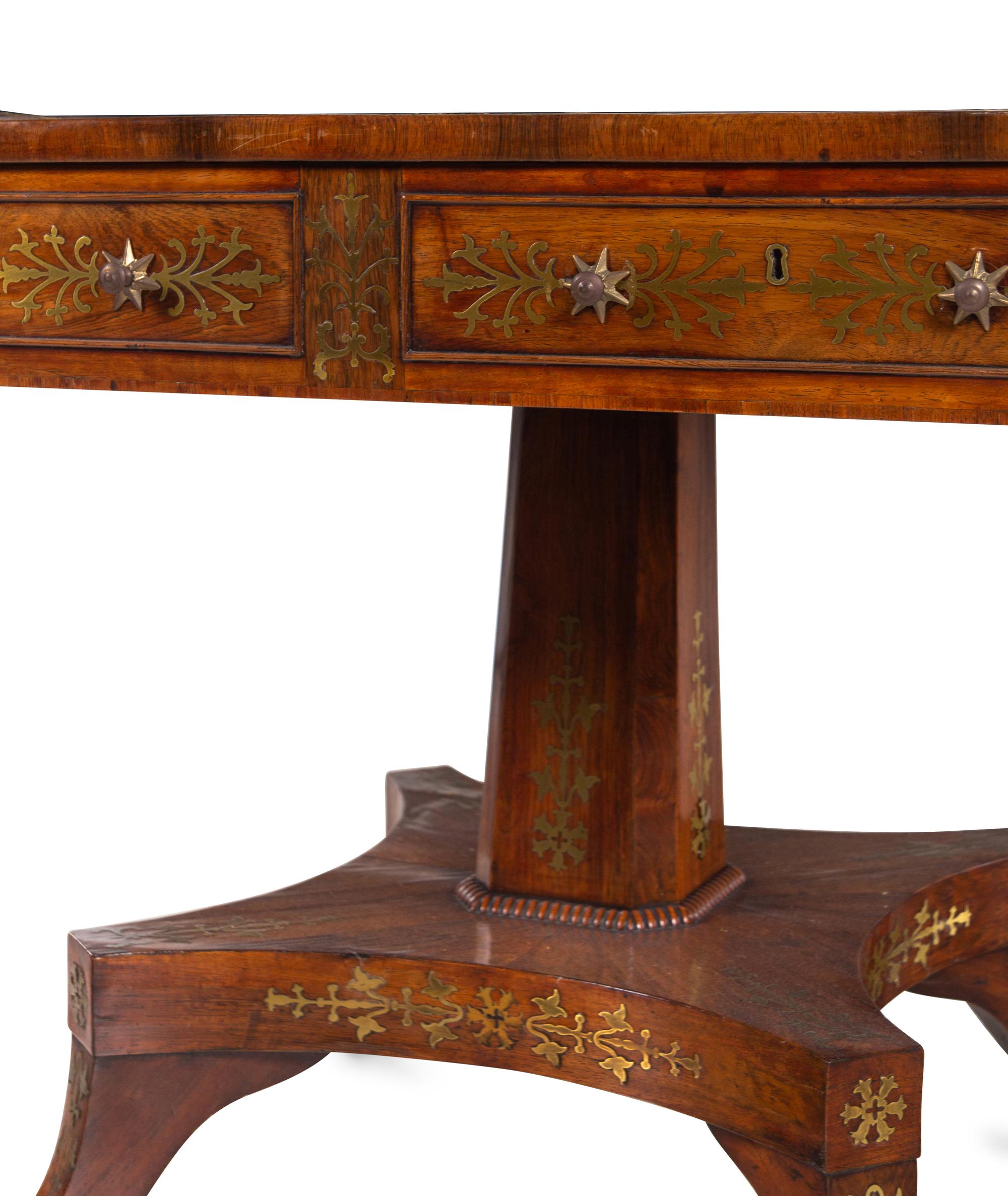 A Regency Brass Inlaid Rosewood Pedestal Sofa Table