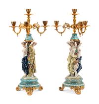 A Pair of Gilt Metal and Porcelain Figural Four-Light Candelabra