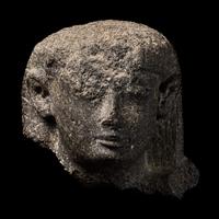 An Egyptian Granite Head of an Official