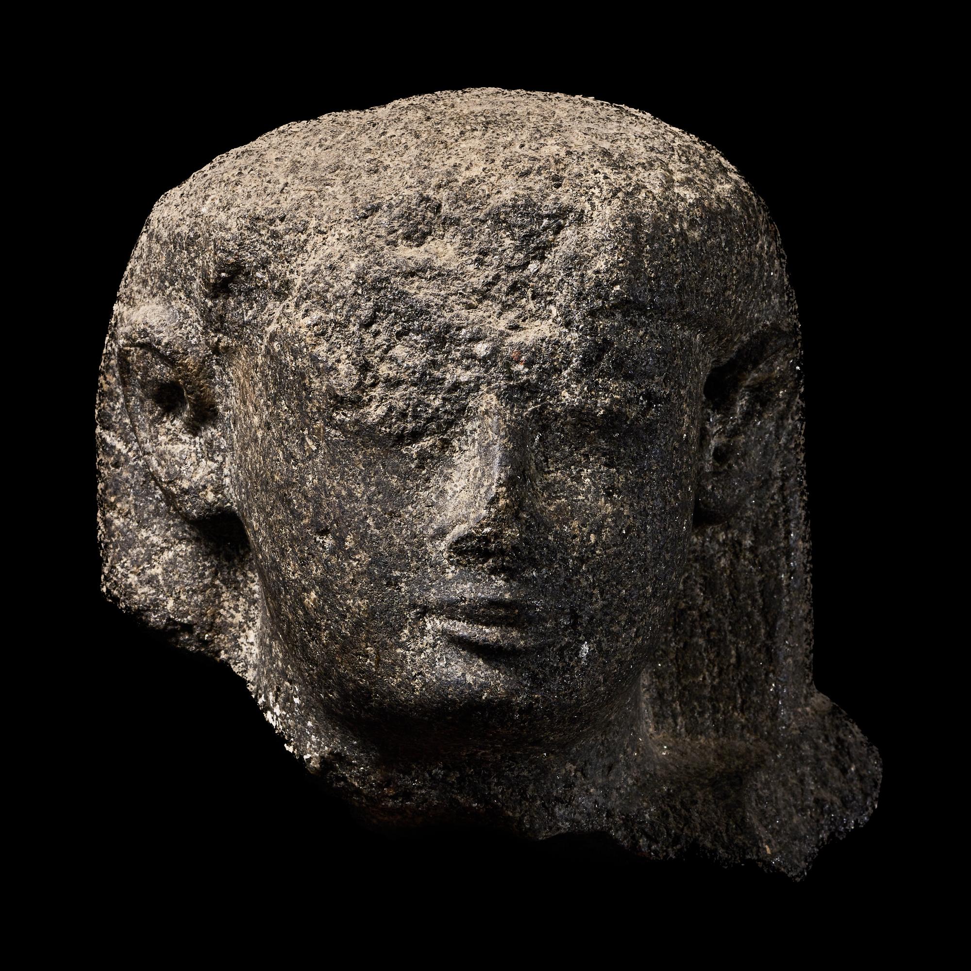An Egyptian Granite Head of an Official