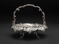 An American Repousse Silver Swing-Handle Basket