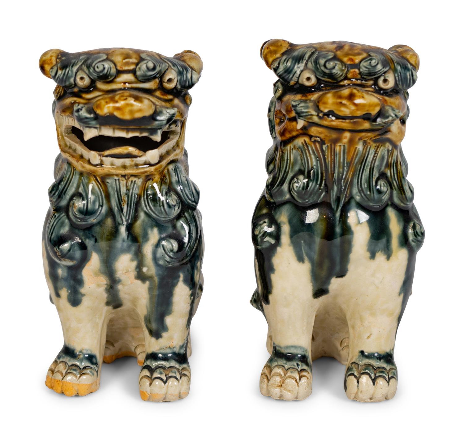 A Pair of Ceramic Models of Buddhistic Lions