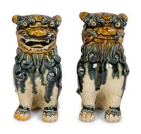 A Pair of Ceramic Models of Buddhistic Lions