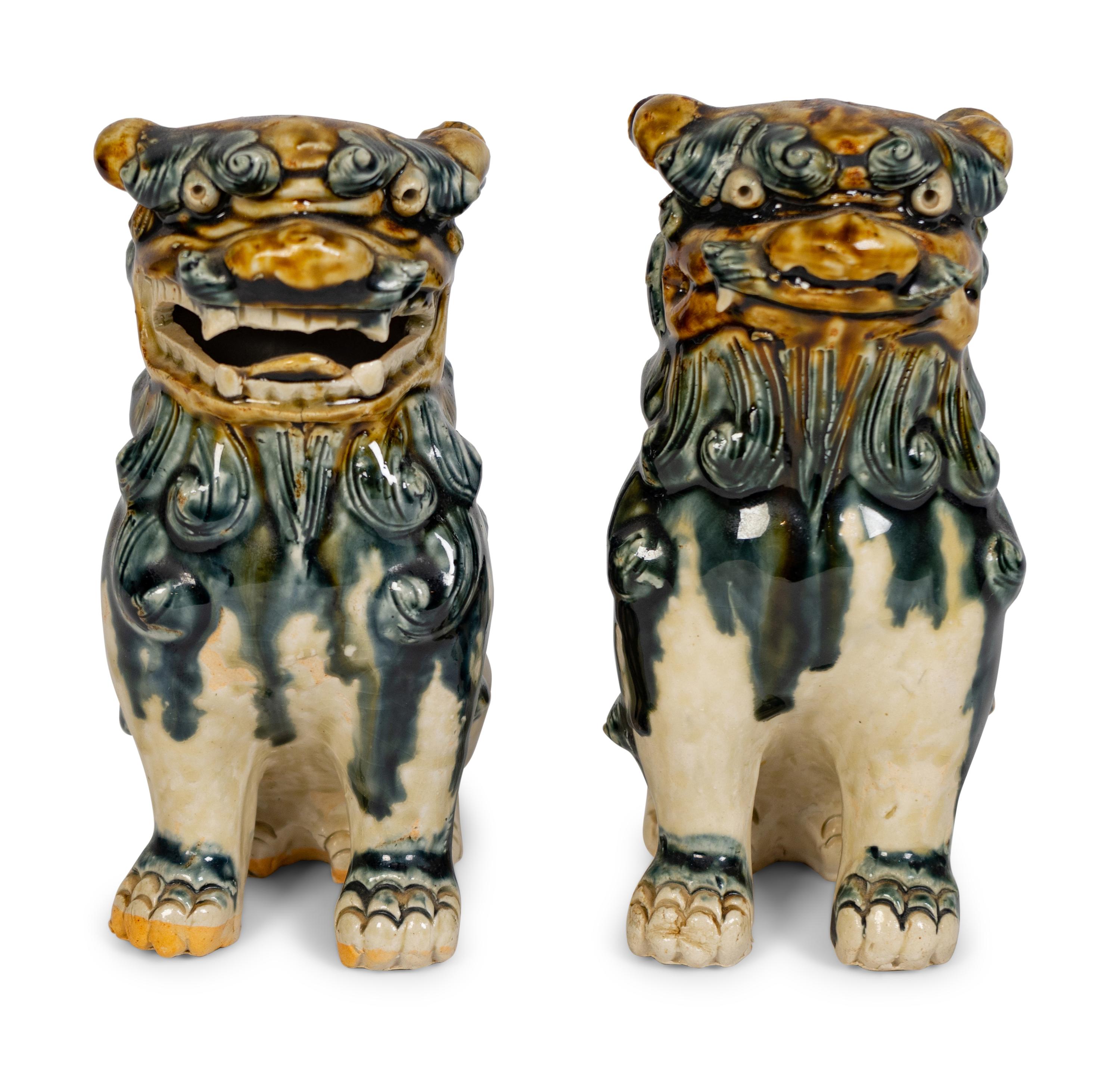 A Pair of Ceramic Models of Buddhistic Lions
