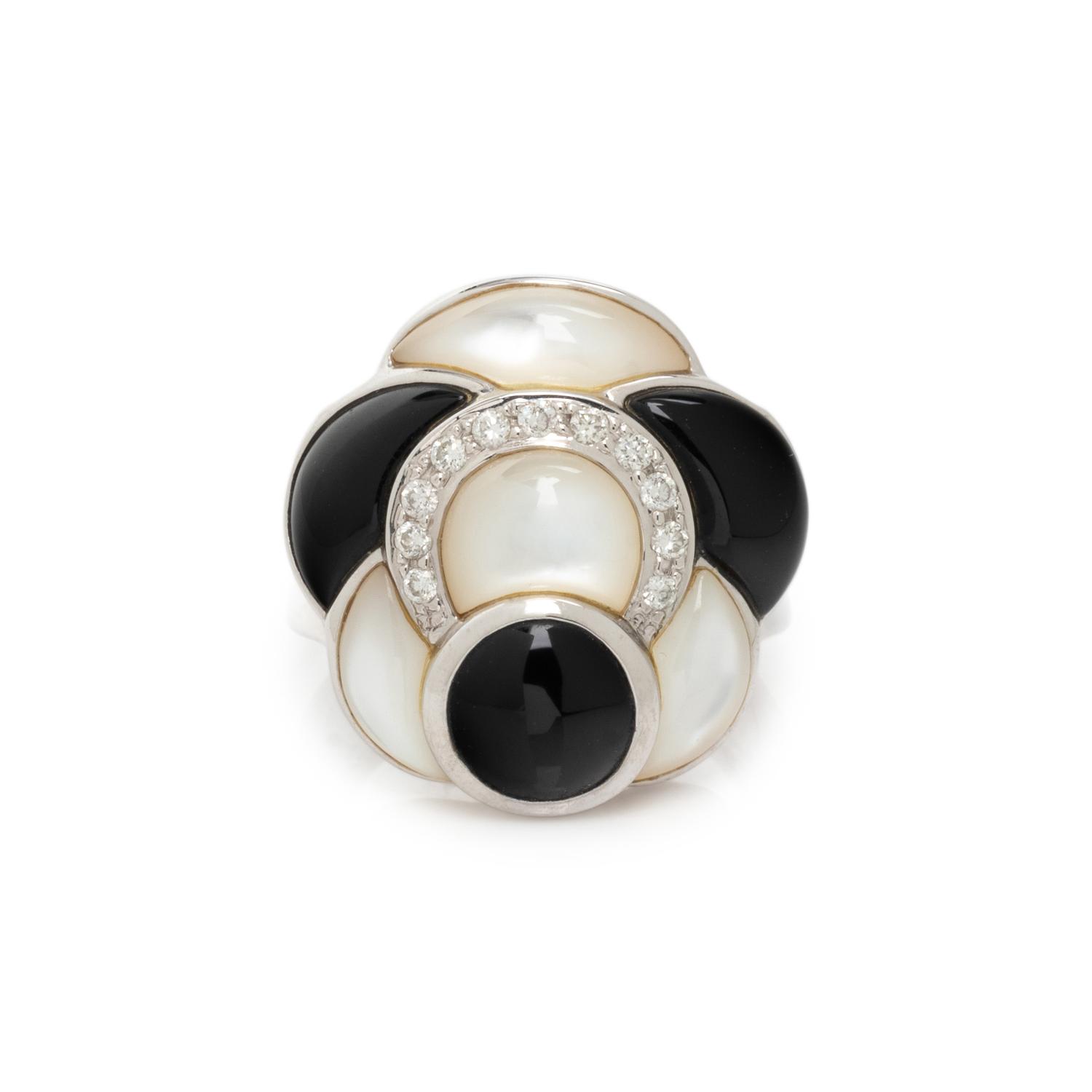 MOTHER-OF-PEARL, ONYX AND DIAMOND RING