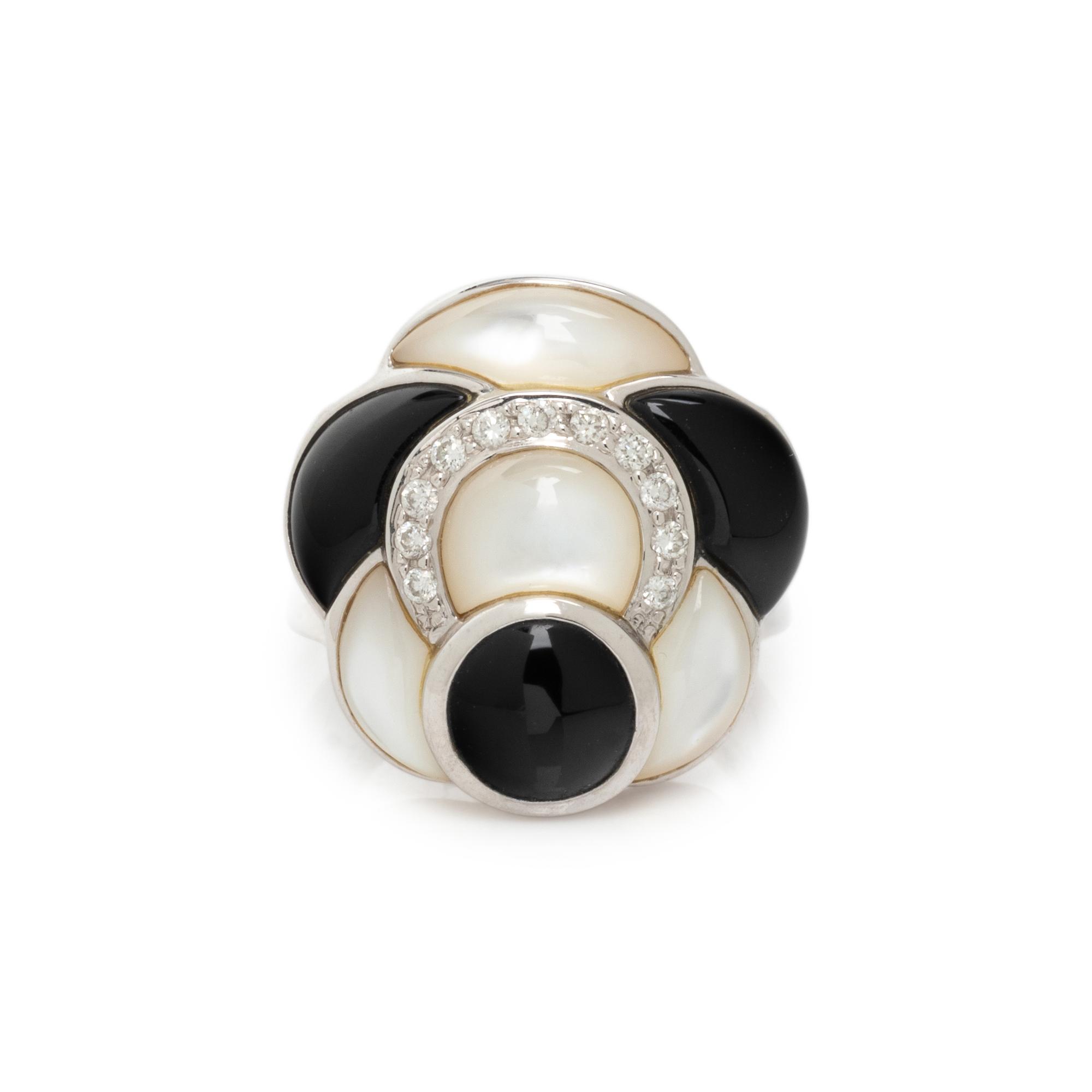 MOTHER-OF-PEARL, ONYX AND DIAMOND RING
