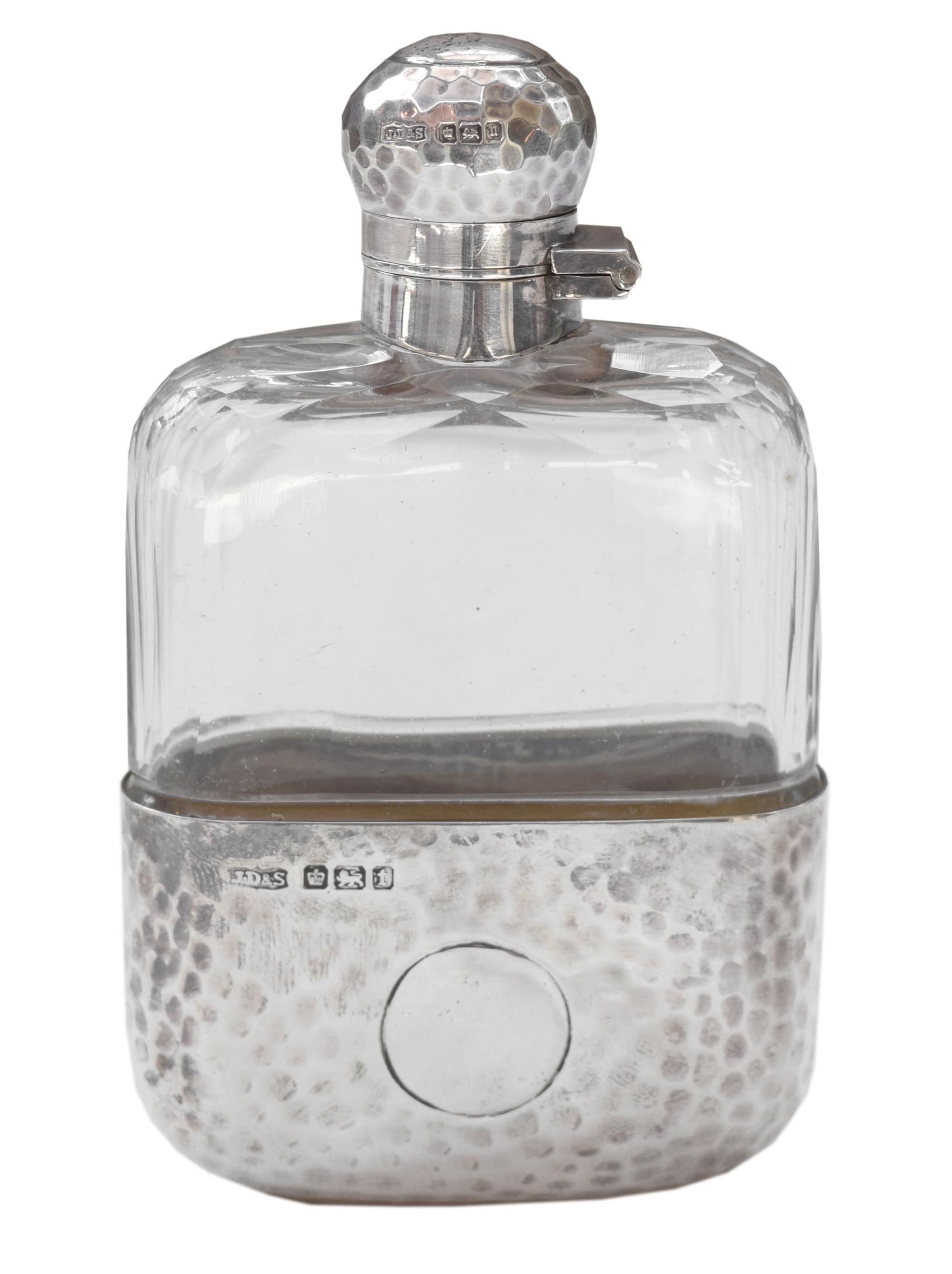 A James Dixon & Sons Hammered Silver and Glass Flask 2.5" W x 1" D x 4.5" H — England, Circa 1911