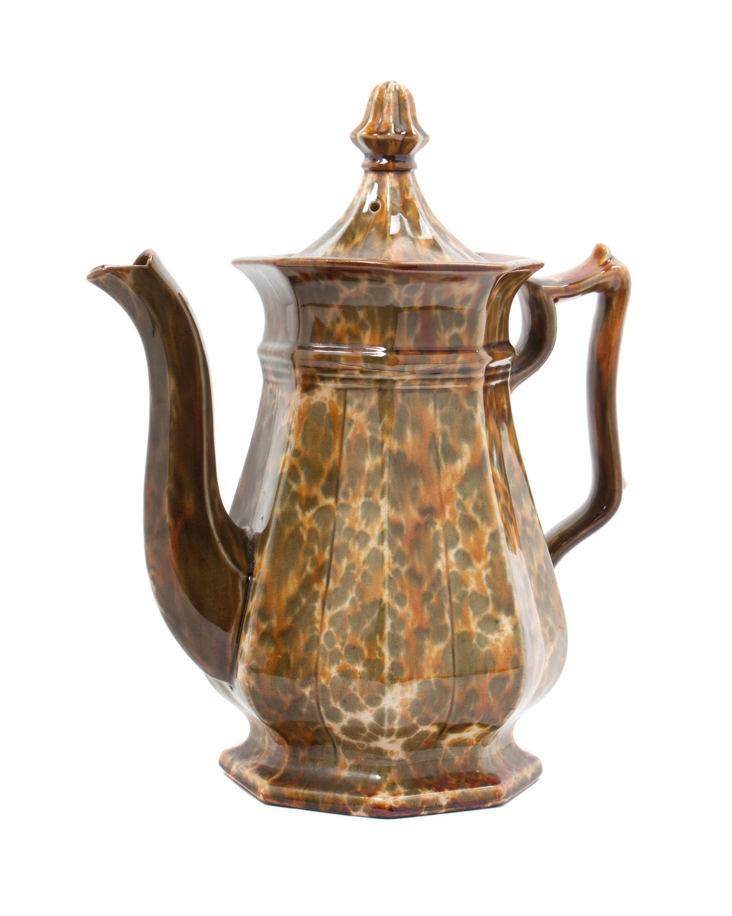 A Bennington Pottery Jug Height 14 inches.