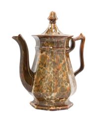 A Bennington Pottery Jug Height 14 inches.