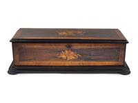 A Swiss Cylinder Music Box in a Rosewood and Marquetry Case