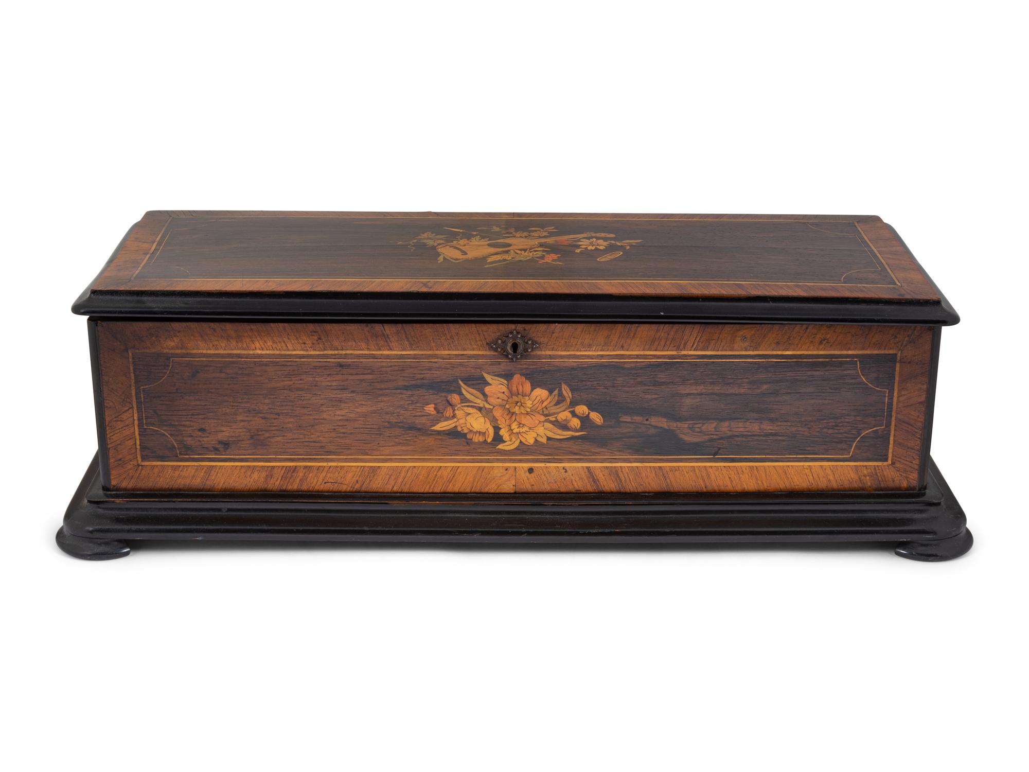 A Swiss Cylinder Music Box in a Rosewood and Marquetry Case