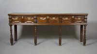 An English Charles II Style Sideboard, Height 34 1/2 x width 83 x depth 19 1/2 inches.