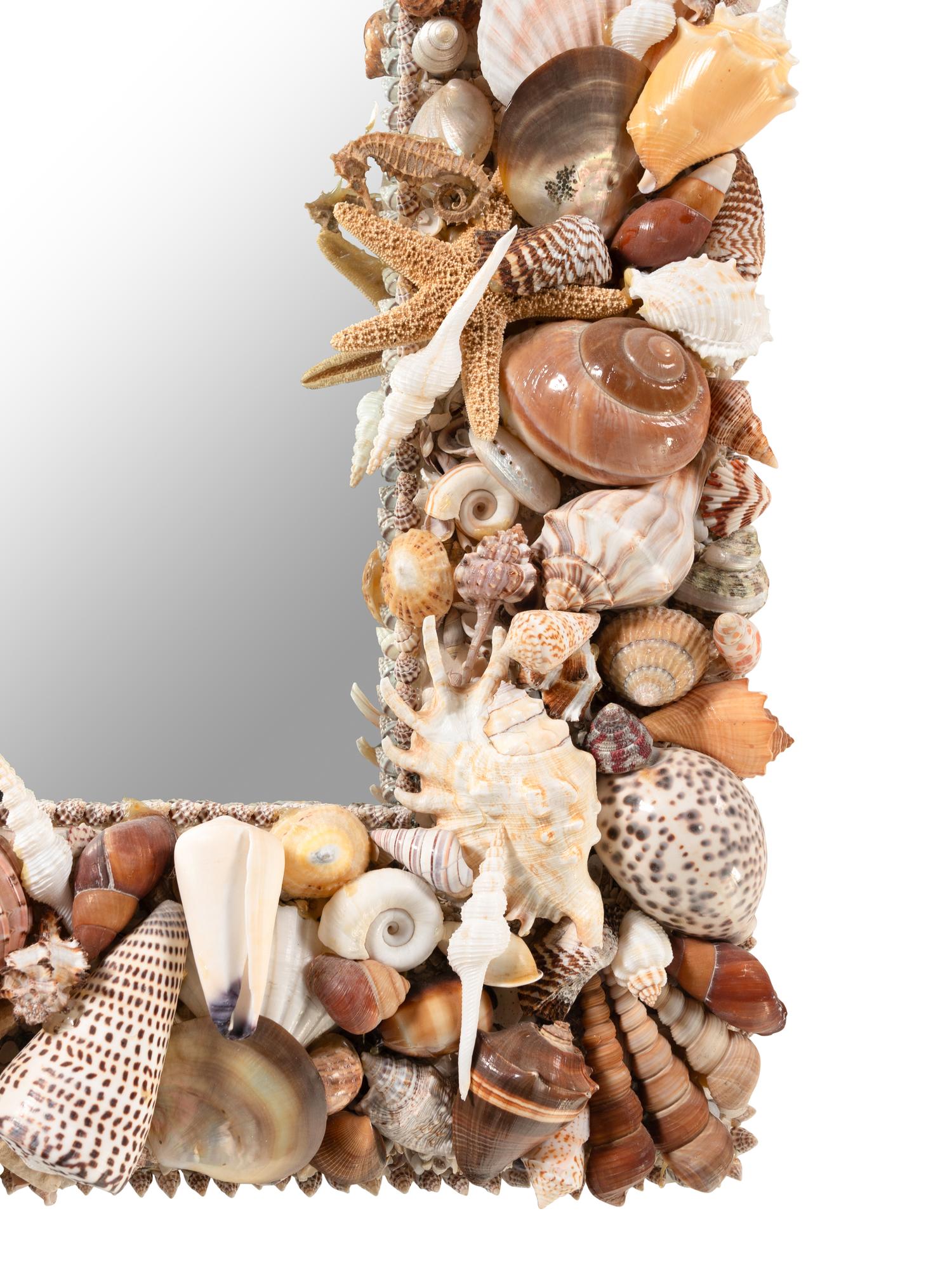 A Pair of Grotto Style Shell-Encrusted Mirrors