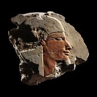 An Egyptian Limestone Relief Fragment with a Nile God