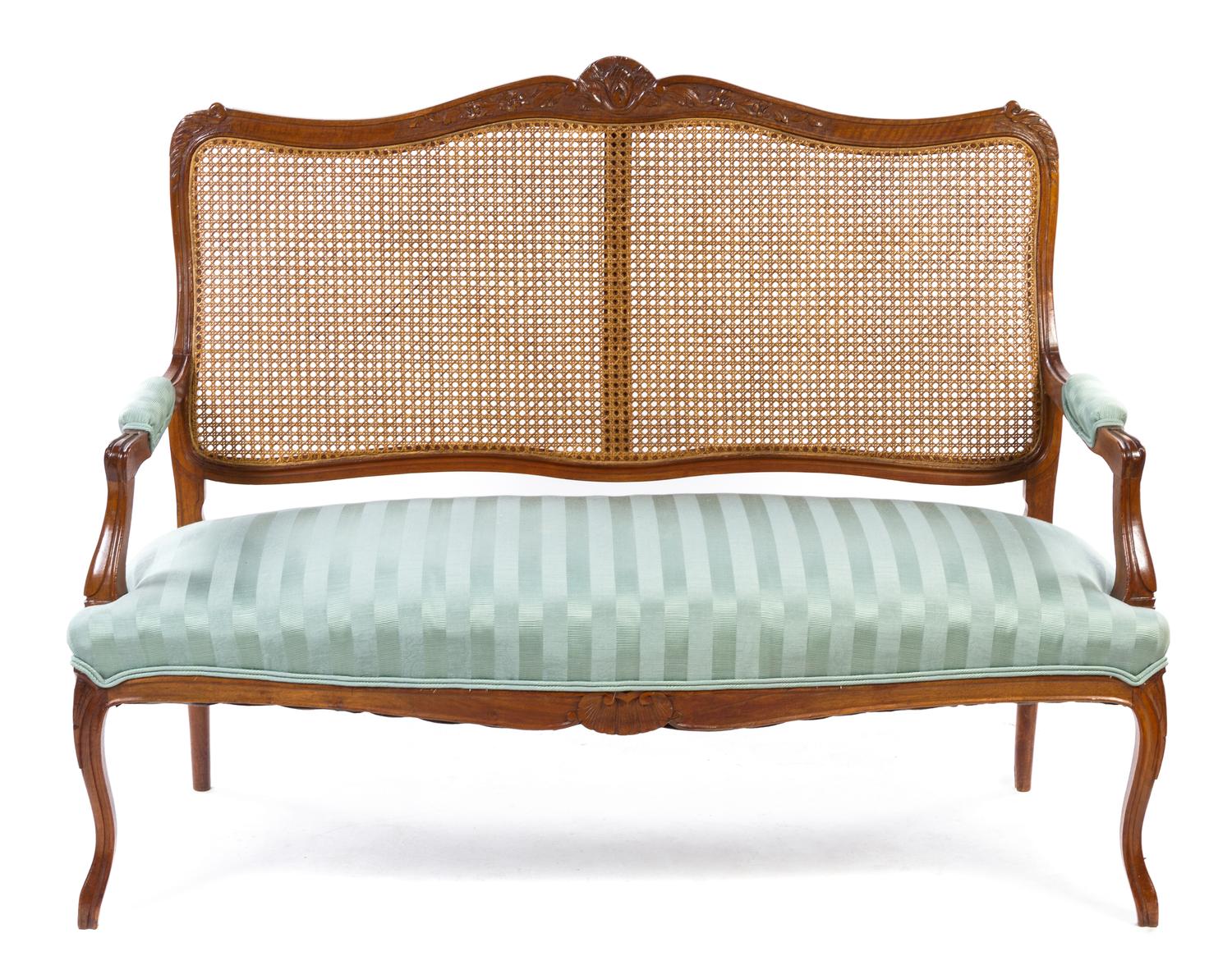 A Louis XV Style Oak Settee Height 41 x width 51 x depth 20 1/2 inches. — 19TH CENTURY