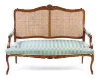 A Louis XV Style Oak Settee Height 41 x width 51 x depth 20 1/2 inches. — 19TH CENTURY