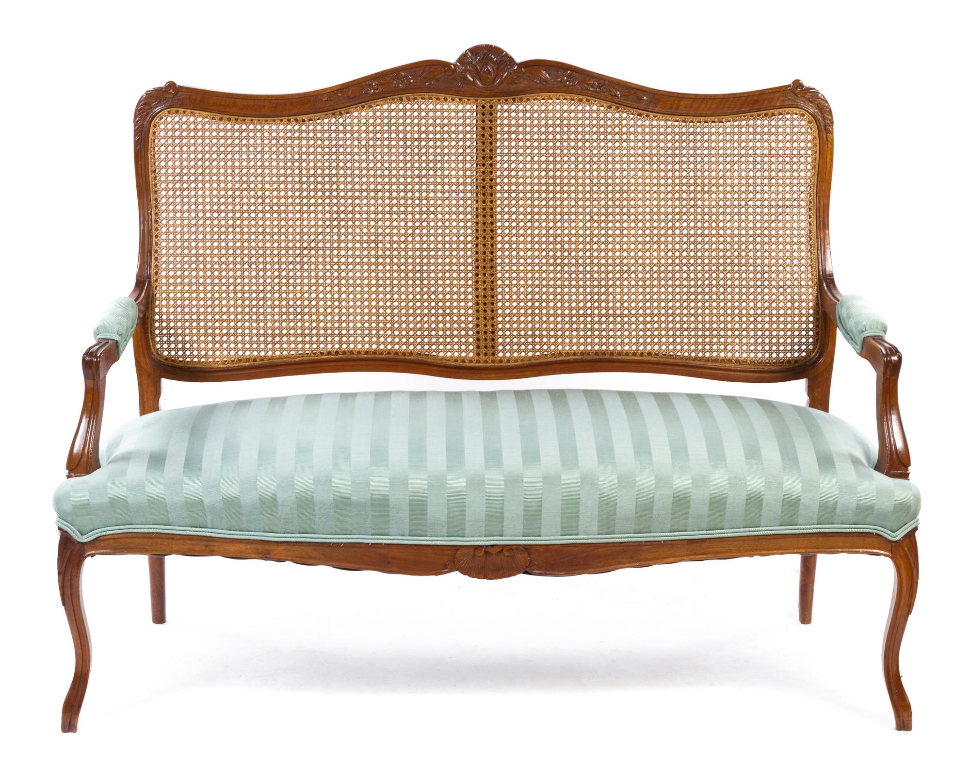 A Louis XV Style Oak Settee Height 41 x width 51 x depth 20 1/2 inches. — 19TH CENTURY
