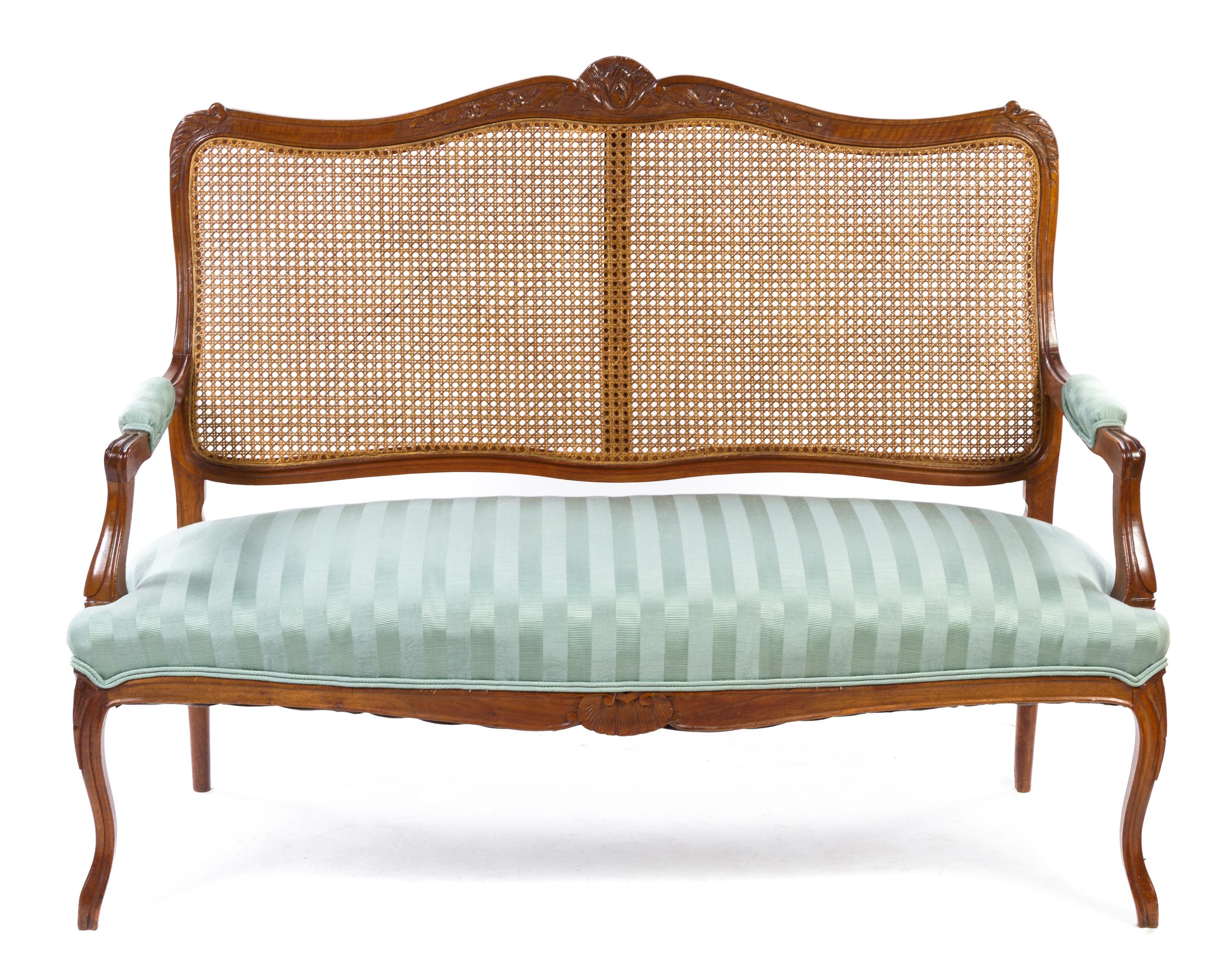 A Louis XV Style Oak Settee Height 41 x width 51 x depth 20 1/2 inches. — 19TH CENTURY