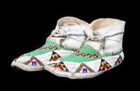 A Pair of Beaded Sioux Moccasins Length 9 3/4 inches. — CIRCA 1900