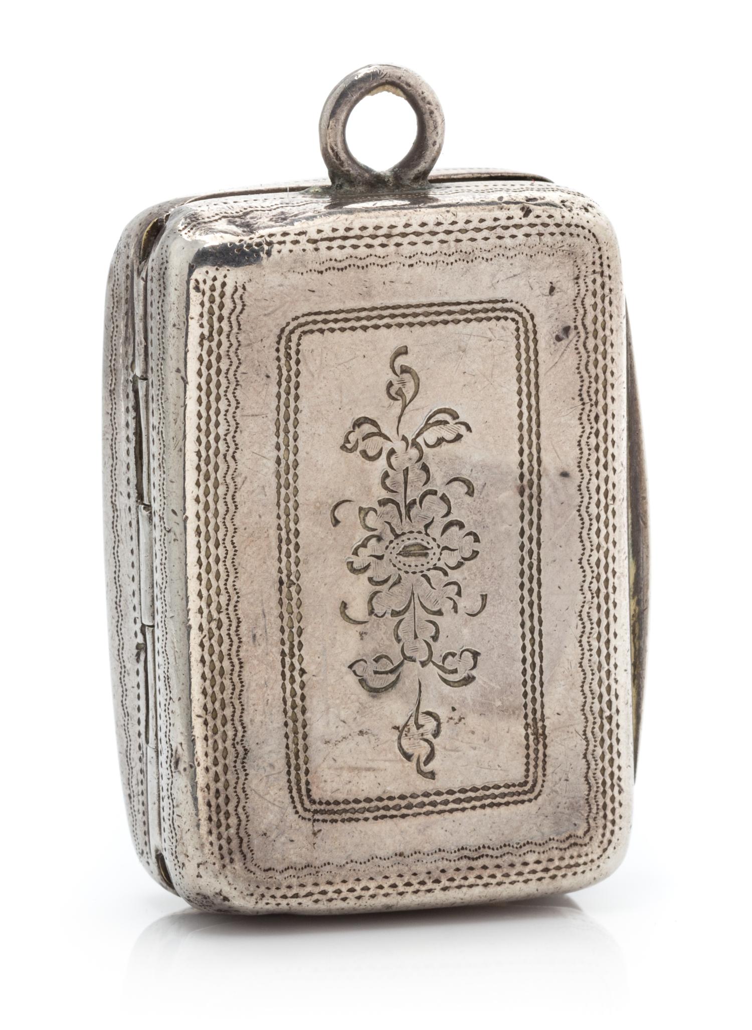 A George III Silver Vinaigrette, Joseph Taylor, Birmingham, 1814, the lid having foliate decoration and centered by a monogrammed carto