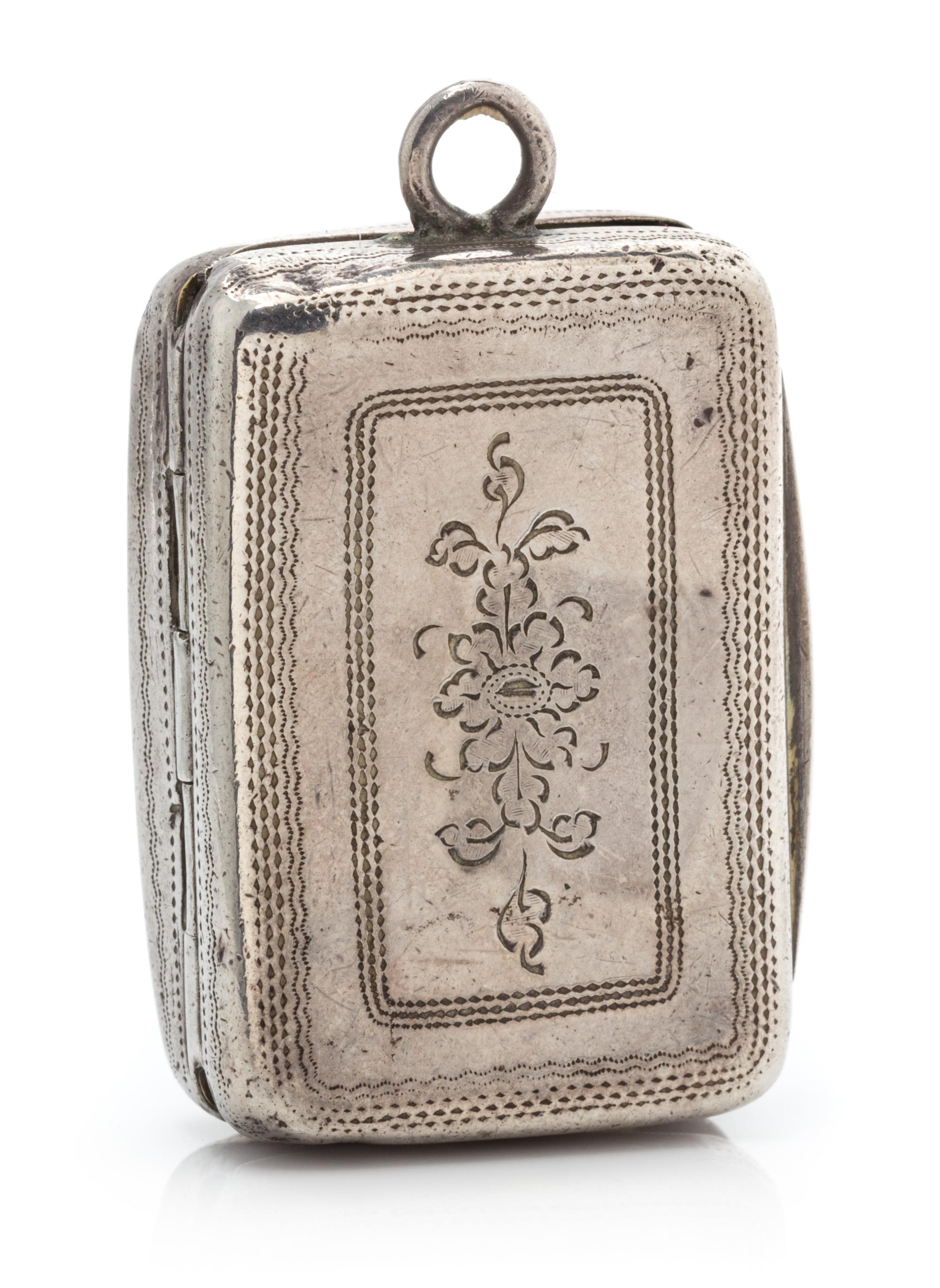A George III Silver Vinaigrette, Joseph Taylor, Birmingham, 1814, the lid having foliate decoration and centered by a monogrammed carto
