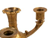 A Pair of Empire Style Gilt and Patinated Bronze Four-Light Candelabra