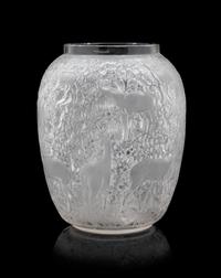 A Lalique Molded Glass Vase, Biches Height 7 x diameter 5 inches.