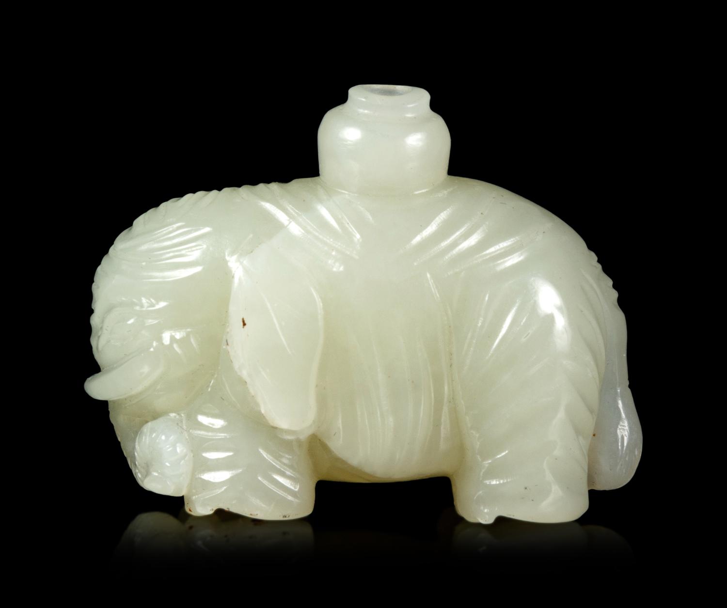 A Small Pale Celadon Jade Figure of an Elephant