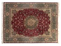 A Tabriz Wool Rug 10 feet x 8 feet.