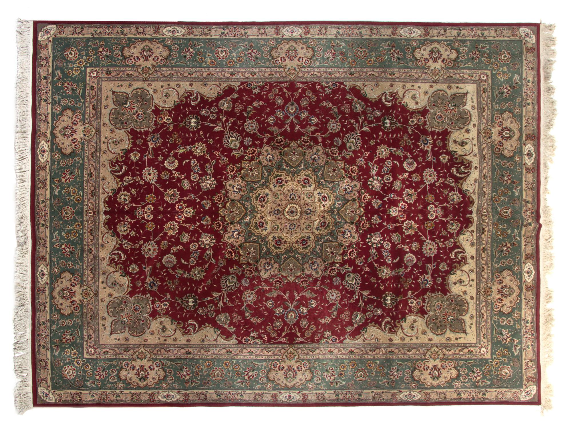 A Tabriz Wool Rug 10 feet x 8 feet.