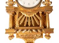 A Gustavian Style Giltwood Wall Clock