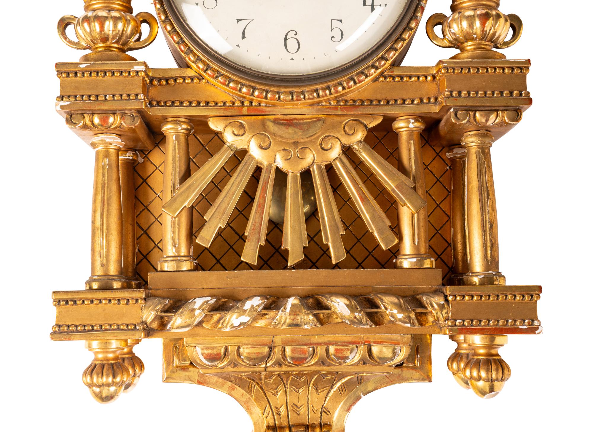 A Gustavian Style Giltwood Wall Clock