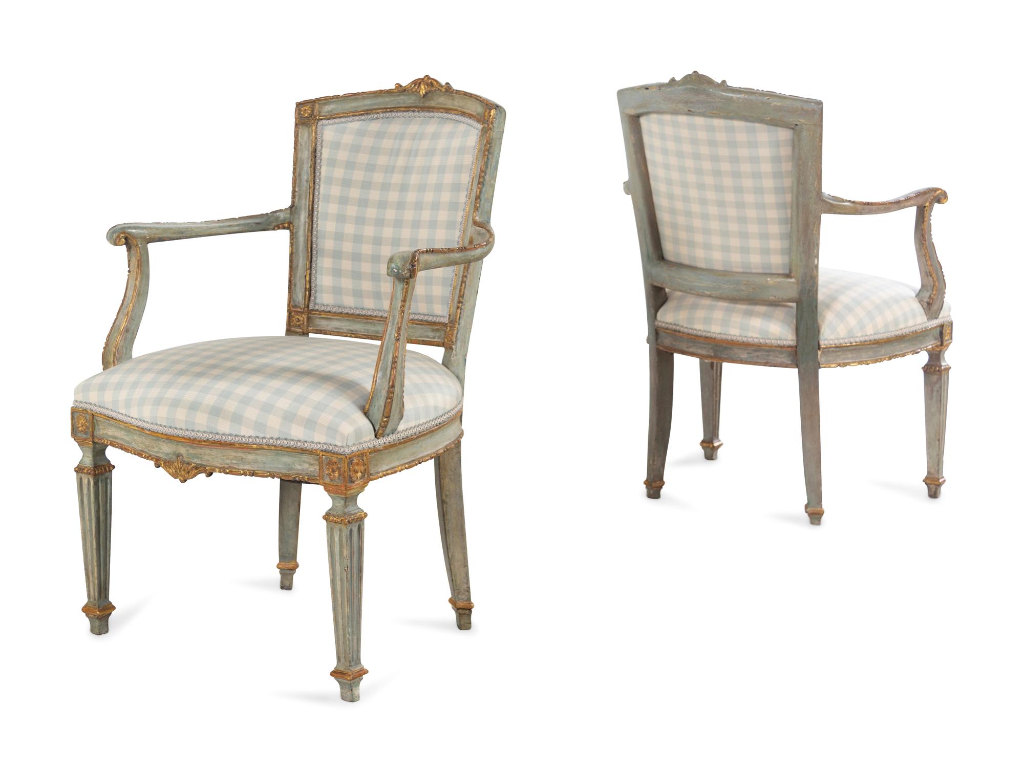 A Pair of Venetian Painted and Parcel Gilt Armchairs