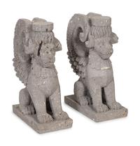 A Pair of Cantera Stone Griffin-Form Pedestals