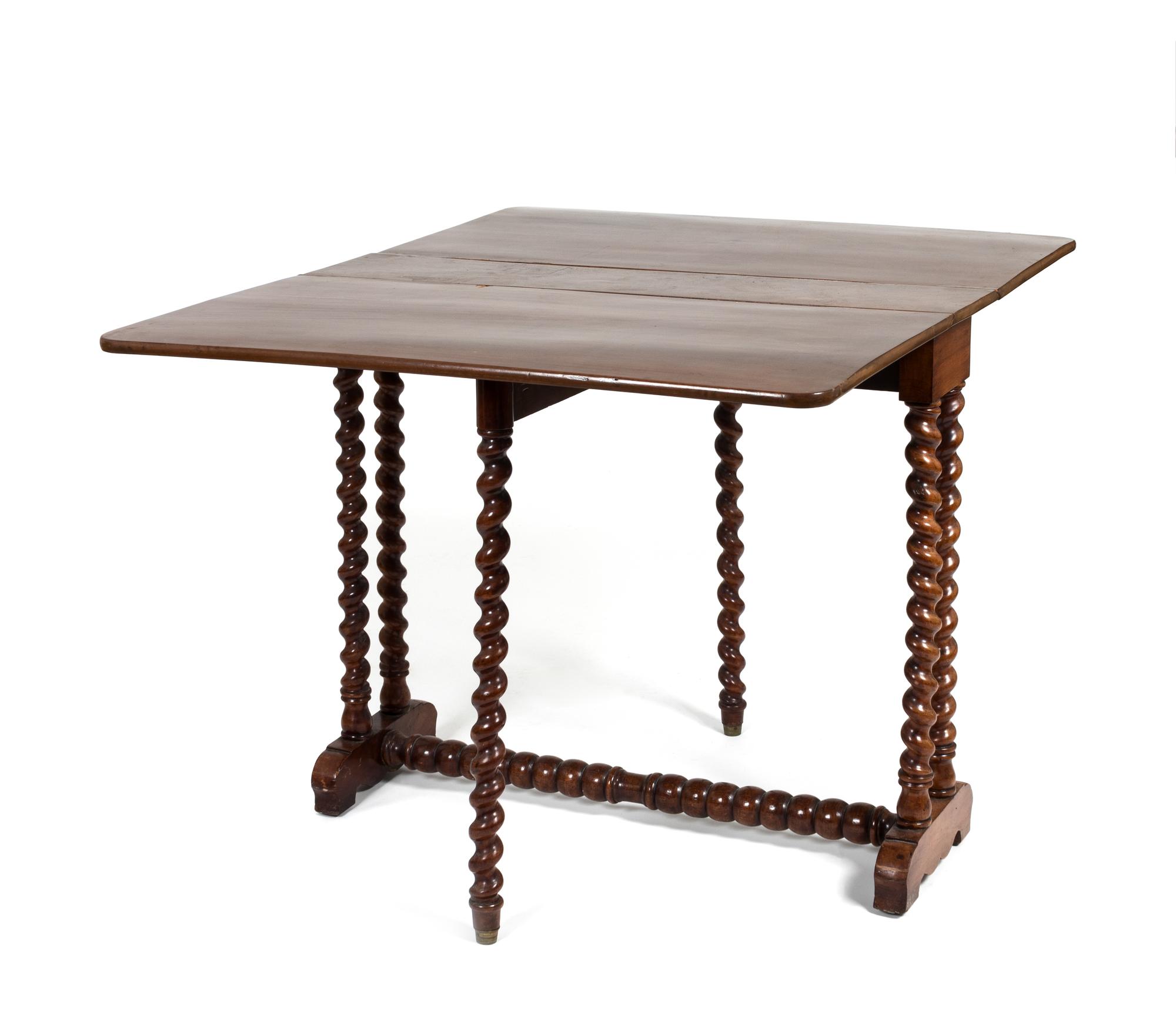 A Jacobean Style Mahogany Drop Leaf Trestle Table — 20TH CENTURY