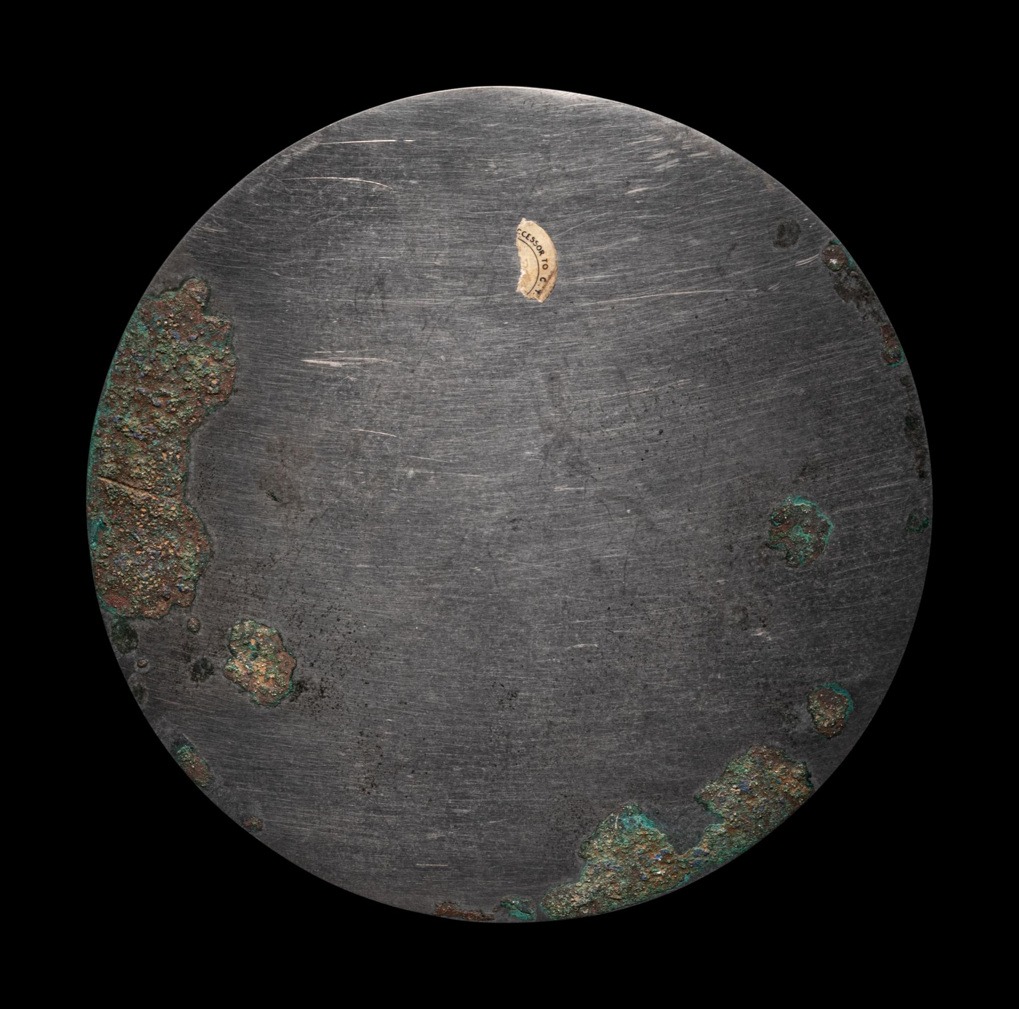 A Bronze 'Moon Palace' Mirror