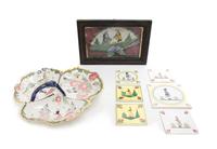 A Group of Eight Quimper Pottery Articles Width of serving dish 13 1/4 inches.