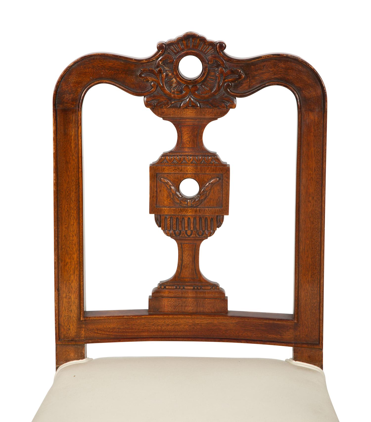 A Set of Eight Italian Walnut Dining Chairs
